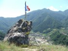 Varful Turtudanul Crucea si steagul de pe Turtudanul Brezoi Turtudanul