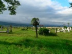 Vedere din cimitir spre poarta secuiasca de la Imeni